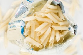 open bag of penne pasta